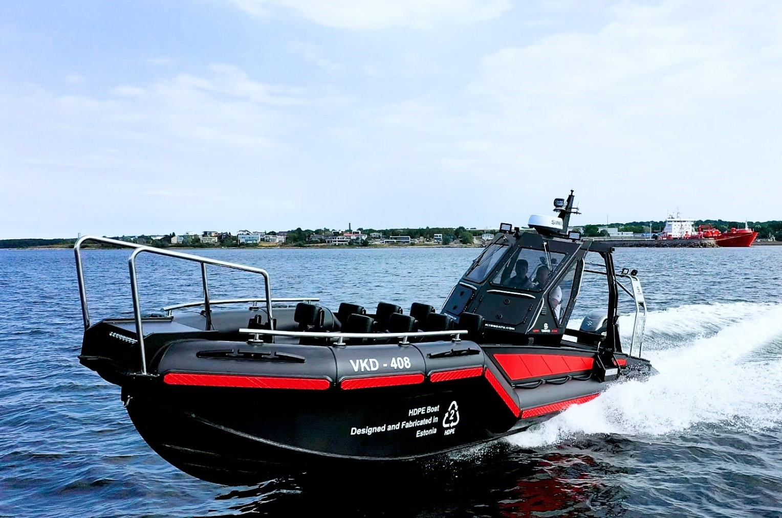 High speed HDPE workboat produced by TS MARINE. This HDPE workboat has black hull and red stripes, a signature line curvature by a HDPE boat manufacturer TS BOATS.